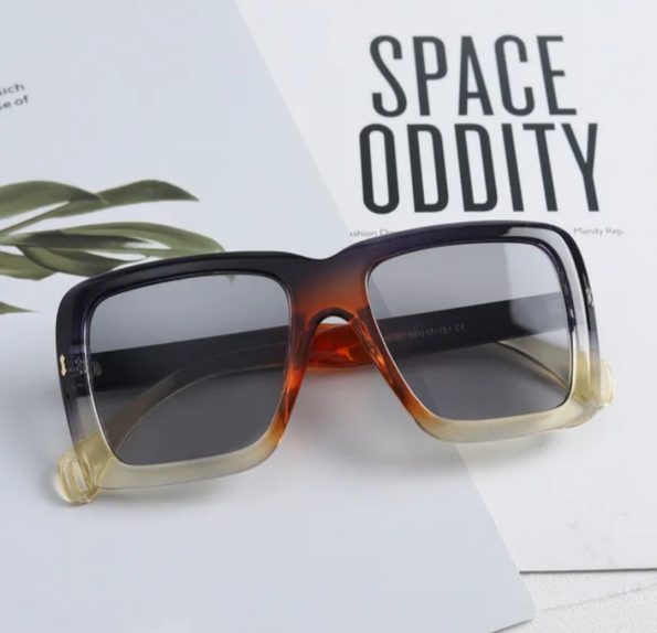 Lentes de sol negro degradado